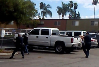 Image released by the El Cajon Police Department, which police say is a snapshot of their encounter with Alfred OlangoEl Cajon Police Department